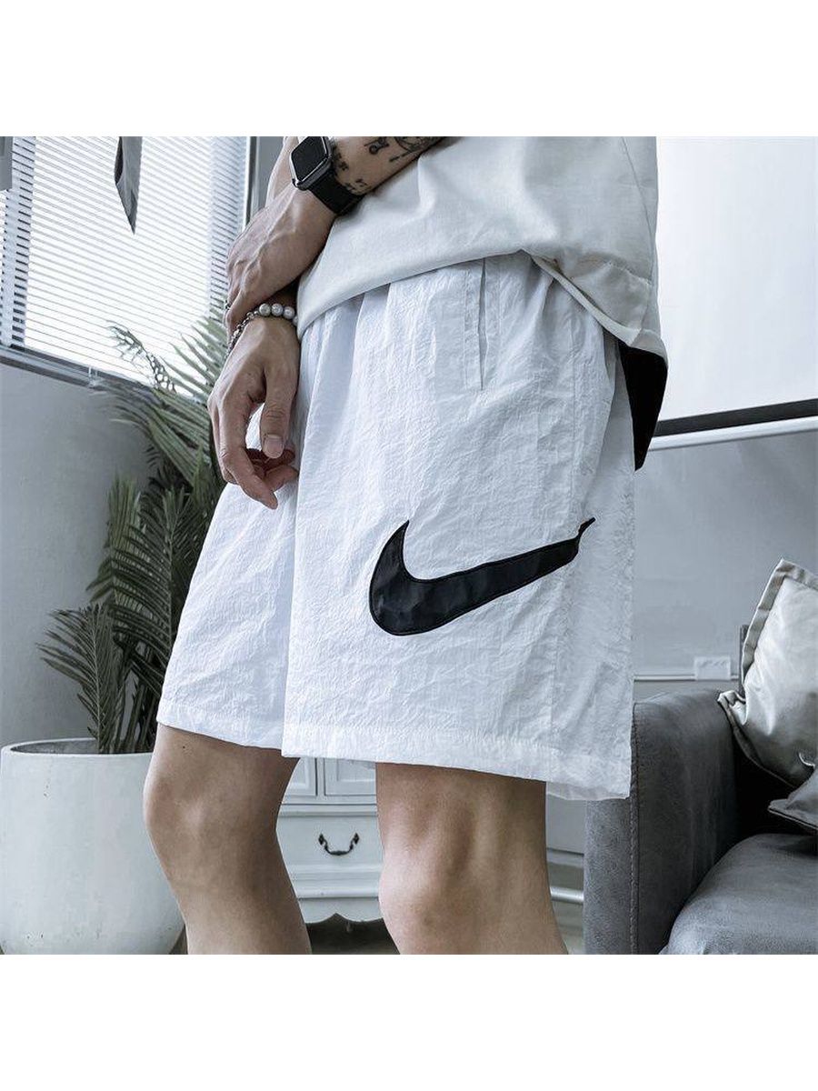 Спортивные штаны Nike Swoosh белые